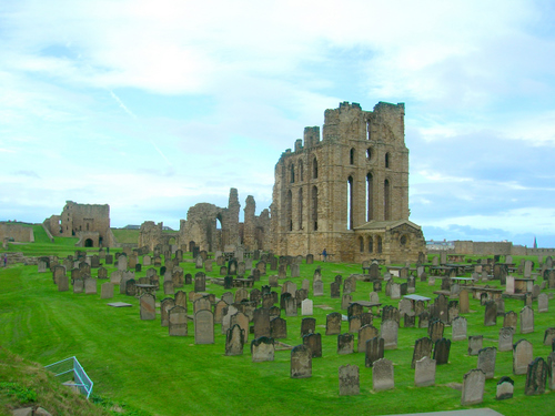 Photograph: A view of the priory church remains, looking north-west across the grave yard